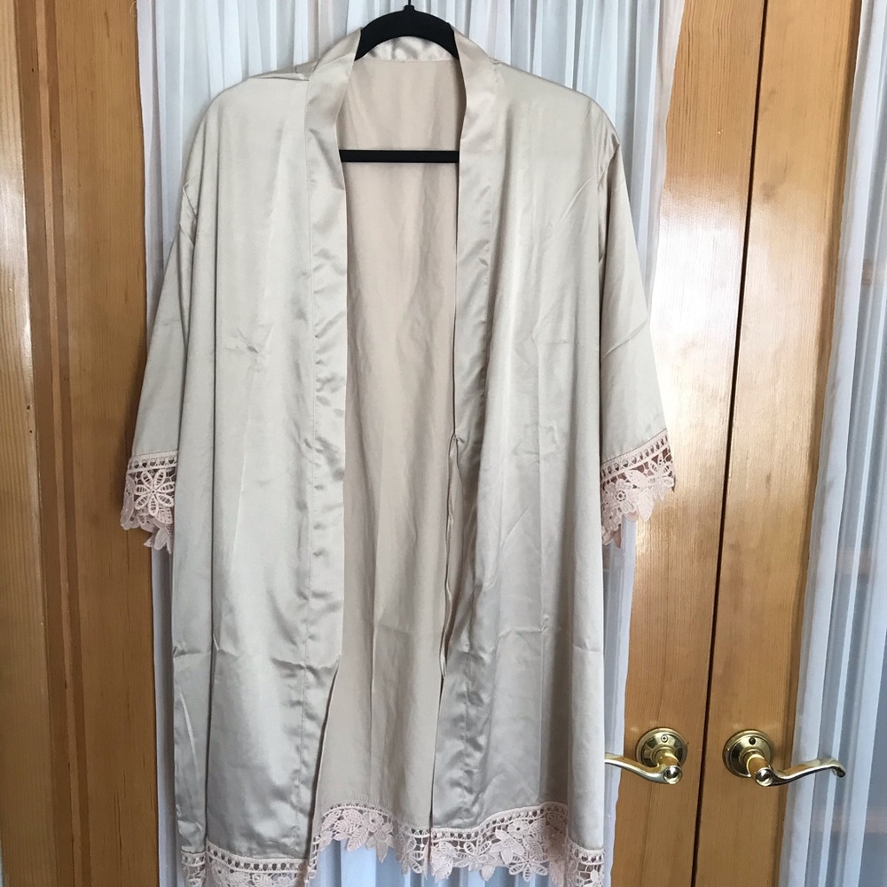 Satin robe with woven weaved embellished sleeves.